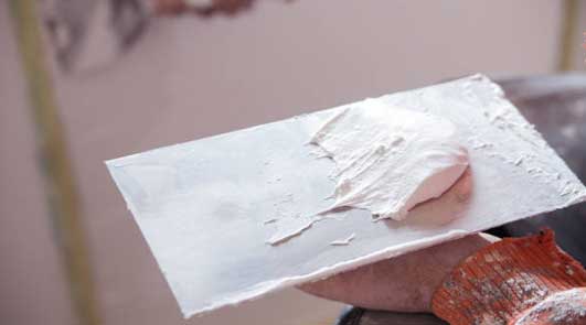 Application d’enduit de lissage